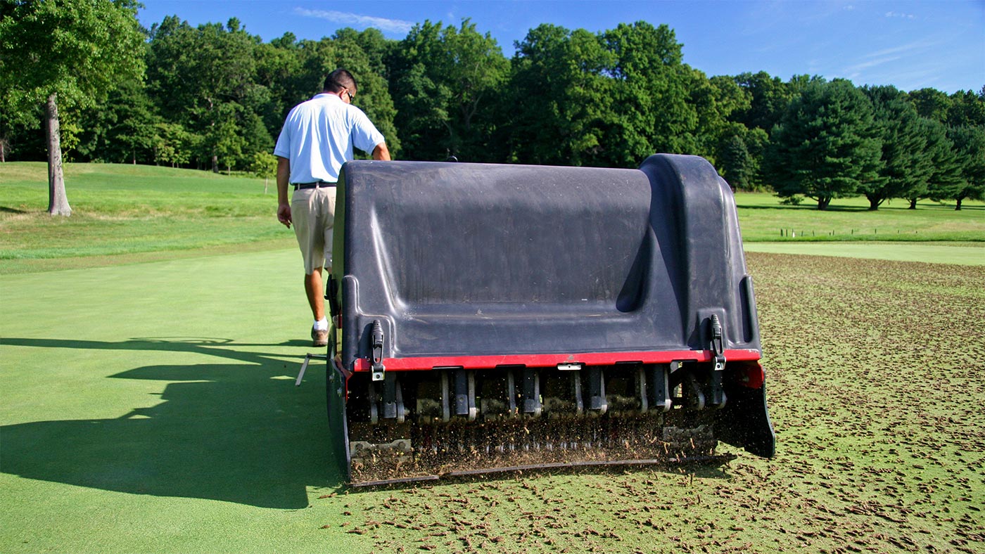 Maskin som luftar en grolfgreen